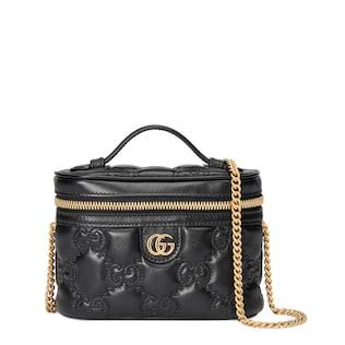 GG matelassé top handle mini bag